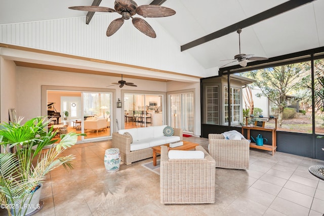 sunroom / solarium featuring vaulted ceiling with beams and ceiling fan