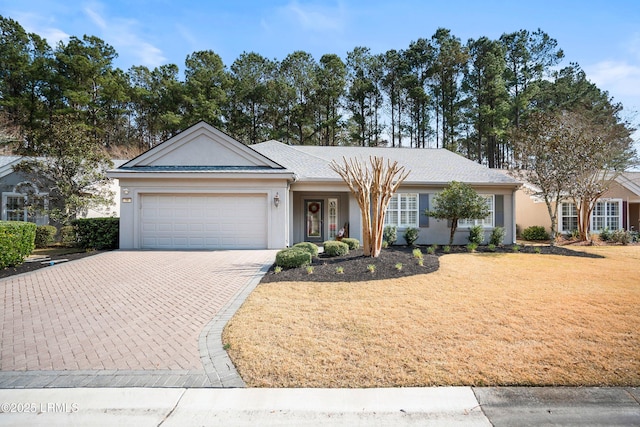 ranch-style home with a garage