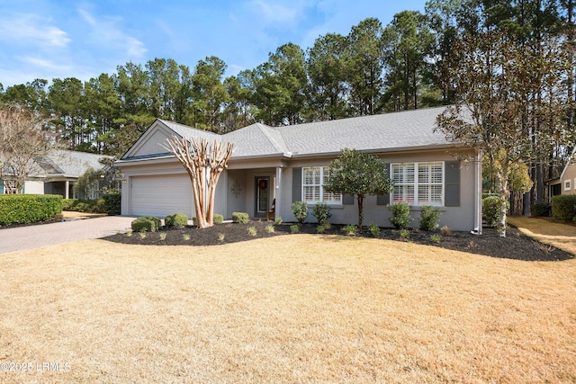 single story home featuring a garage