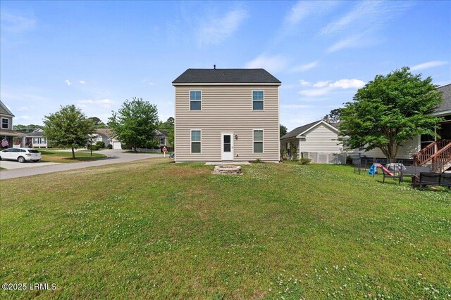 28 Kings Cross Ct, Beaufort, SC 29902 - back of house with a fire pit