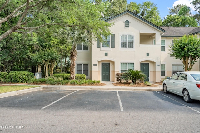897 Fording Island Rd Unit 301, Bluffton, SC 29910 - multi unit property with uncovered parking and stucco siding