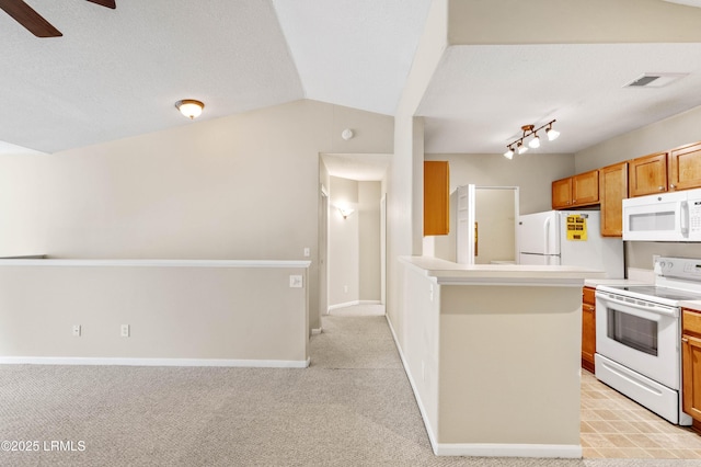 897 Fording Island Rd Unit 301, Bluffton, SC 29910 - kitchen with white appliances, a ceiling fan, light colored carpet, a peninsula, and light countertops