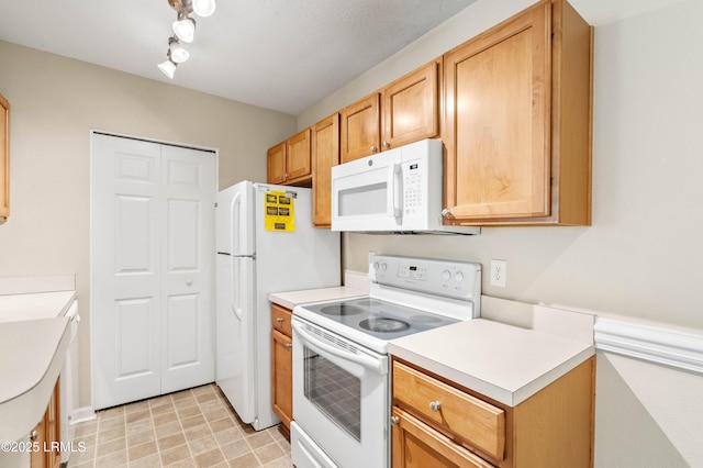 897 Fording Island Rd Unit 301, Bluffton, SC 29910 - kitchen with white appliances and light countertops