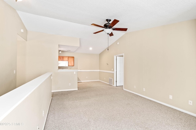 897 Fording Island Rd Unit 301, Bluffton, SC 29910 - empty room with a ceiling fan, lofted ceiling, light colored carpet, and baseboards