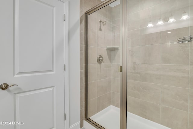 bathroom featuring walk in shower