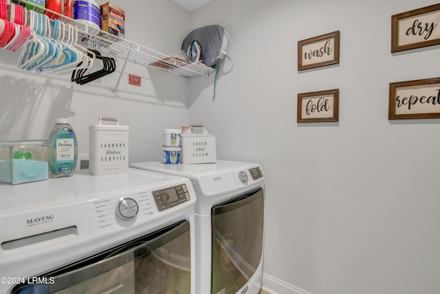 laundry area with washer and clothes dryer