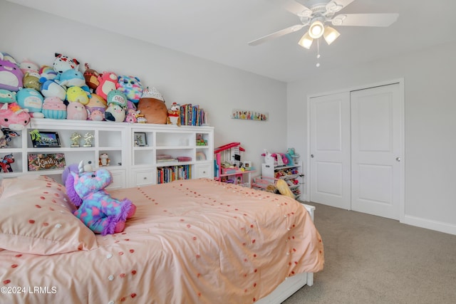 bedroom with a closet, ceiling fan, and carpet flooring