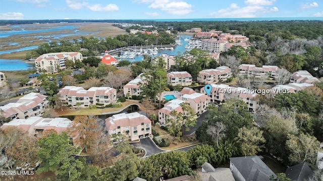 birds eye view of property featuring a water view