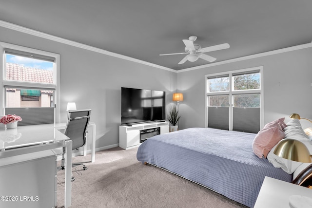 bedroom with ceiling fan, light colored carpet, and ornamental molding