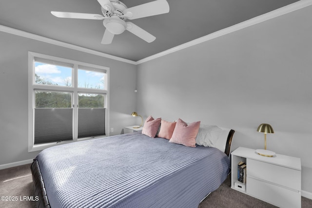 carpeted bedroom with ceiling fan and ornamental molding