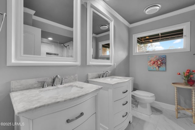 bathroom featuring vanity, crown molding, and toilet