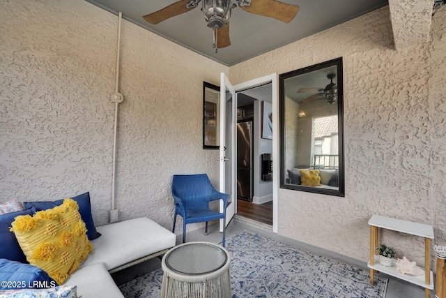 view of patio / terrace featuring ceiling fan