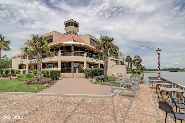 view of building exterior with a water view