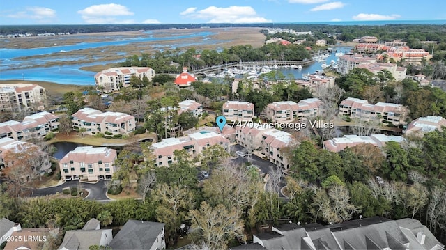 birds eye view of property featuring a water view