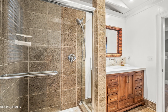 bathroom with a stall shower, tasteful backsplash, and vanity