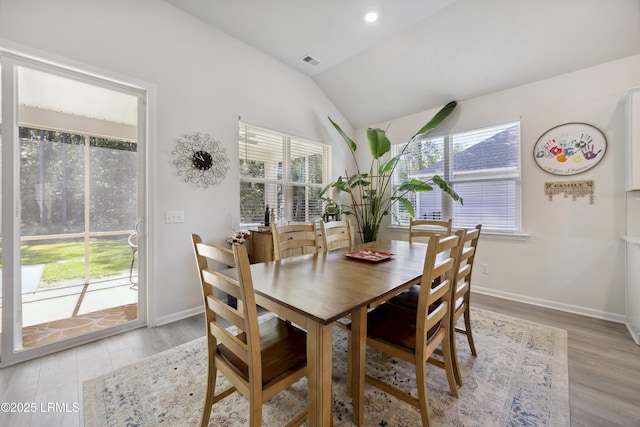 120 Sifted Grain Rd, Bluffton, SC 29909 - dining area featuring healthy amount of natural light, lofted ceiling, light wood-style flooring, baseboards, and recessed lighting