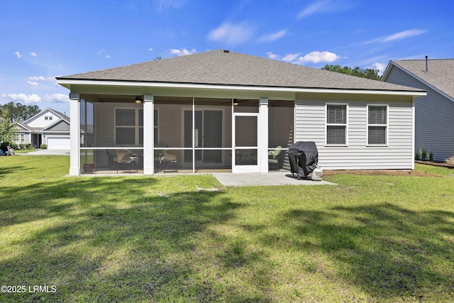 120 Sifted Grain Rd, Bluffton, SC 29909 - rear view of property featuring a sunroom, a yard, roof with shingles, and a patio area