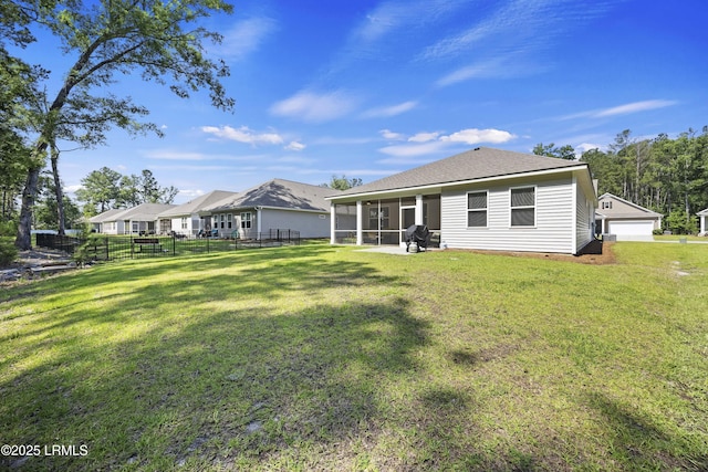 120 Sifted Grain Rd, Bluffton, SC 29909 - back of property featuring a sunroom, a garage, and a shingled roof