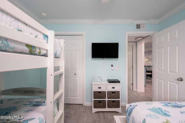 663 William Hilton Pkwy Unit 2126, Hilton Head Island, SC 29928 - bedroom featuring ornamental molding and wood finished floors