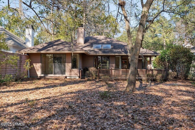 view of front of home with a chimney