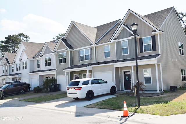 townhome / multi-family property featuring a garage