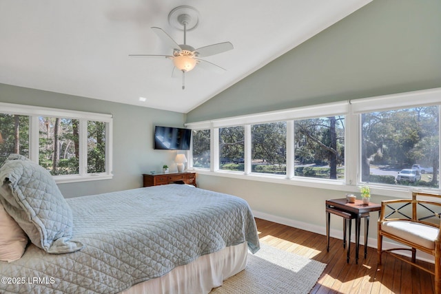 34 W Beach Lagoon Dr, Hilton Head Island, SC 29928 - bedroom featuring baseboards, wood-type flooring, lofted ceiling, and ceiling fan