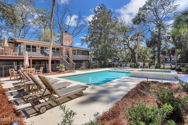 34 W Beach Lagoon Dr, Hilton Head Island, SC 29928 - view of swimming pool with a fenced in pool, fence, stairs, and a patio area