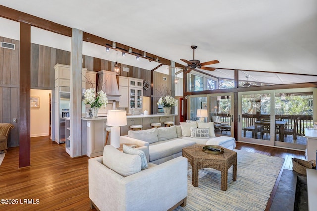 34 W Beach Lagoon Dr, Hilton Head Island, SC 29928 - living area with high vaulted ceiling, wood finished floors, visible vents, and ceiling fan