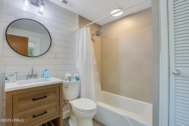 34 W Beach Lagoon Dr, Hilton Head Island, SC 29928 - bathroom featuring vanity, toilet, visible vents, and shower / tub combo with curtain