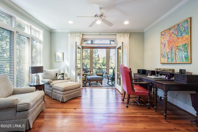 home office with crown molding, hardwood / wood-style floors, and ceiling fan