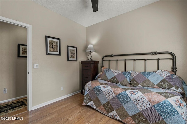 101 Redtail Dr, Bluffton, SC 29909 - bedroom with wood finished floors, ceiling fan, and a textured ceiling