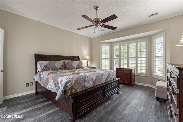 101 Redtail Dr, Bluffton, SC 29909 - bedroom featuring dark wood-type flooring, a textured ceiling, crown molding, and ceiling fan