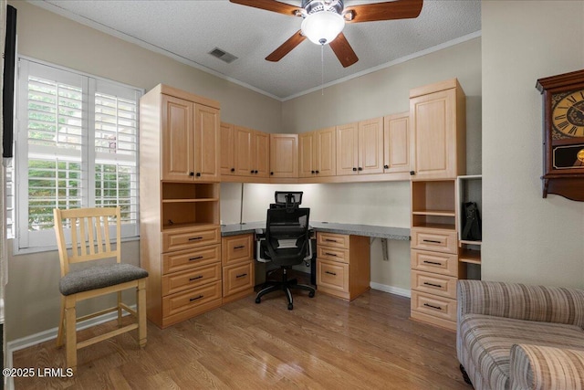 101 Redtail Dr, Bluffton, SC 29909 - office with a ceiling fan, built in study area, light wood-style floors, crown molding, and a textured ceiling
