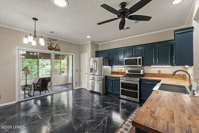 101 Redtail Dr, Bluffton, SC 29909 - kitchen featuring appliances with stainless steel finishes, wooden counters, dark marble finish flooring, ceiling fan, and a textured ceiling