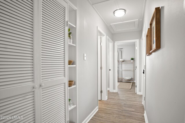 hallway with light wood-type flooring