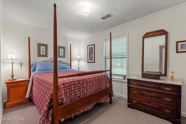 carpeted bedroom featuring a textured ceiling, visible vents, baseboards, and ornamental molding