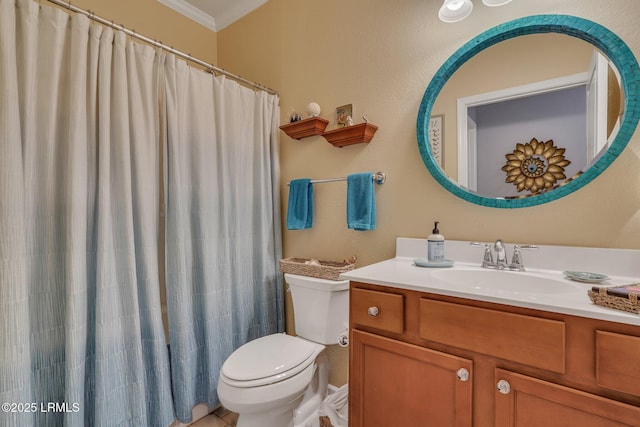 bathroom featuring a shower with curtain, crown molding, vanity, and toilet