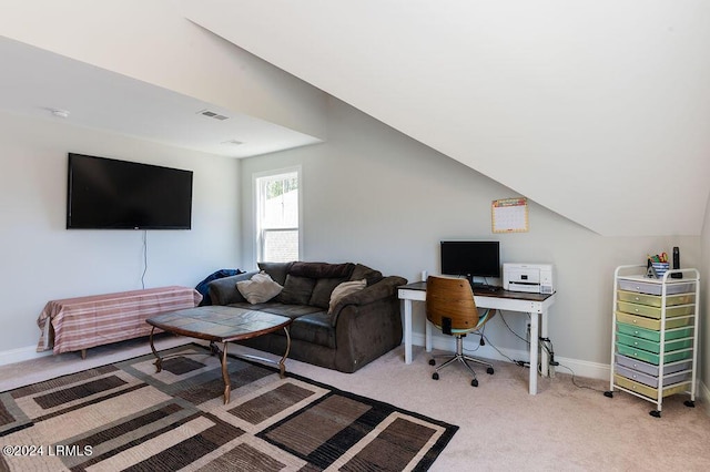 office featuring lofted ceiling and carpet floors