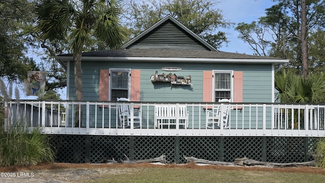 rear view of property with a deck