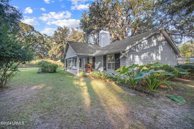 view of front of home with a front yard