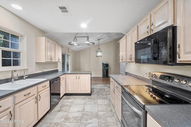 kitchen featuring sink, pendant lighting, a textured ceiling, and black appliances