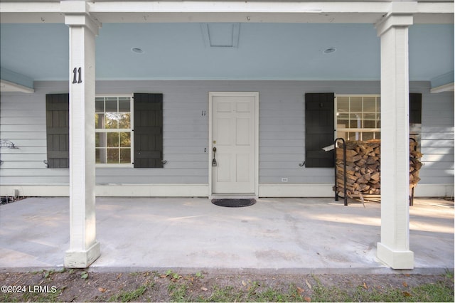 doorway to property with a patio