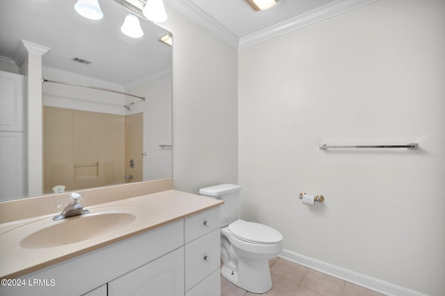 bathroom featuring tile patterned floors, ornamental molding, toilet, and vanity