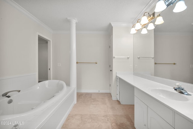 bathroom featuring vanity, a bath, ornamental molding, and a textured ceiling