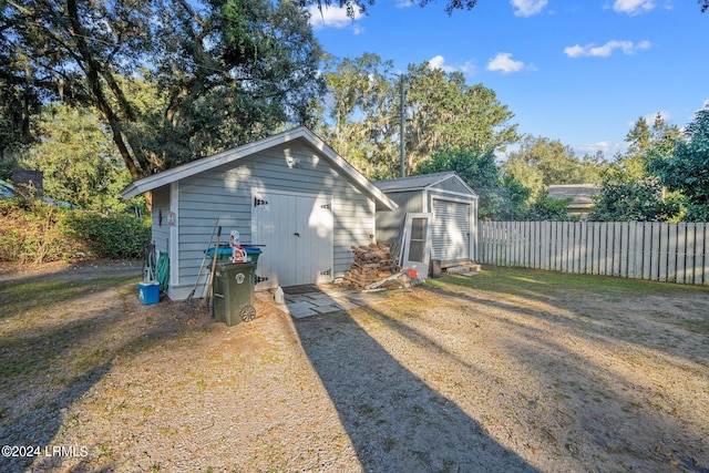 exterior space featuring a storage unit