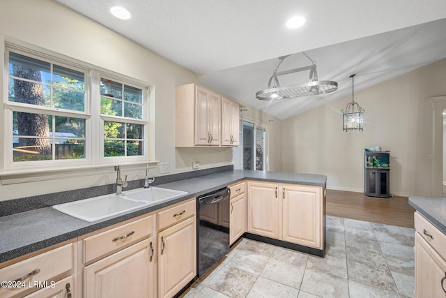 kitchen with pendant lighting, sink, dishwasher, kitchen peninsula, and light brown cabinets