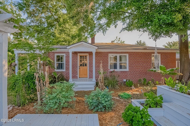 ranch-style house with brick siding