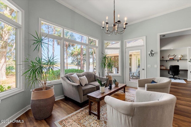 sunroom featuring a notable chandelier