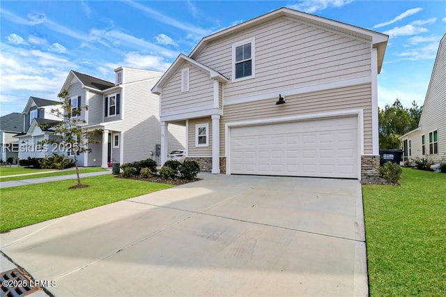 view of front property with a garage and a front yard