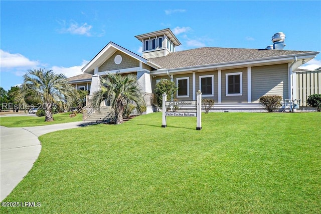 view of front of property with a front lawn